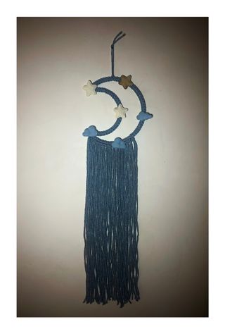Tenture motif lune pour chambre de bébé